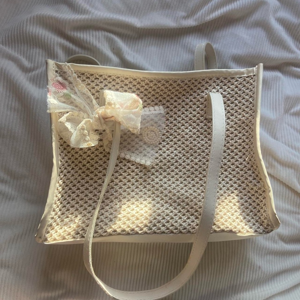 Tan bag with removable ribbon